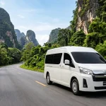 White Toyota Commuter van driving Phuket to Krabi private transfer route
