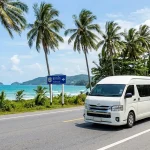 White Toyota Commuter van driving Phuket to Khao Lak private transfer route