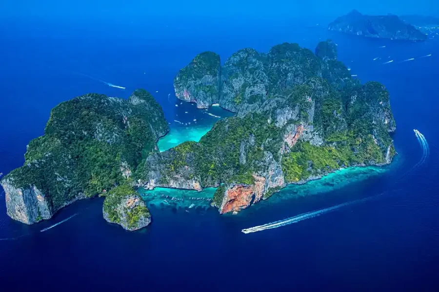 Aerial view of Phi Phi Islands surrounded by turquoise water and limestone cliffs Krabi Private Phi Phi Islands Snorkeling & Sightseeing Tour